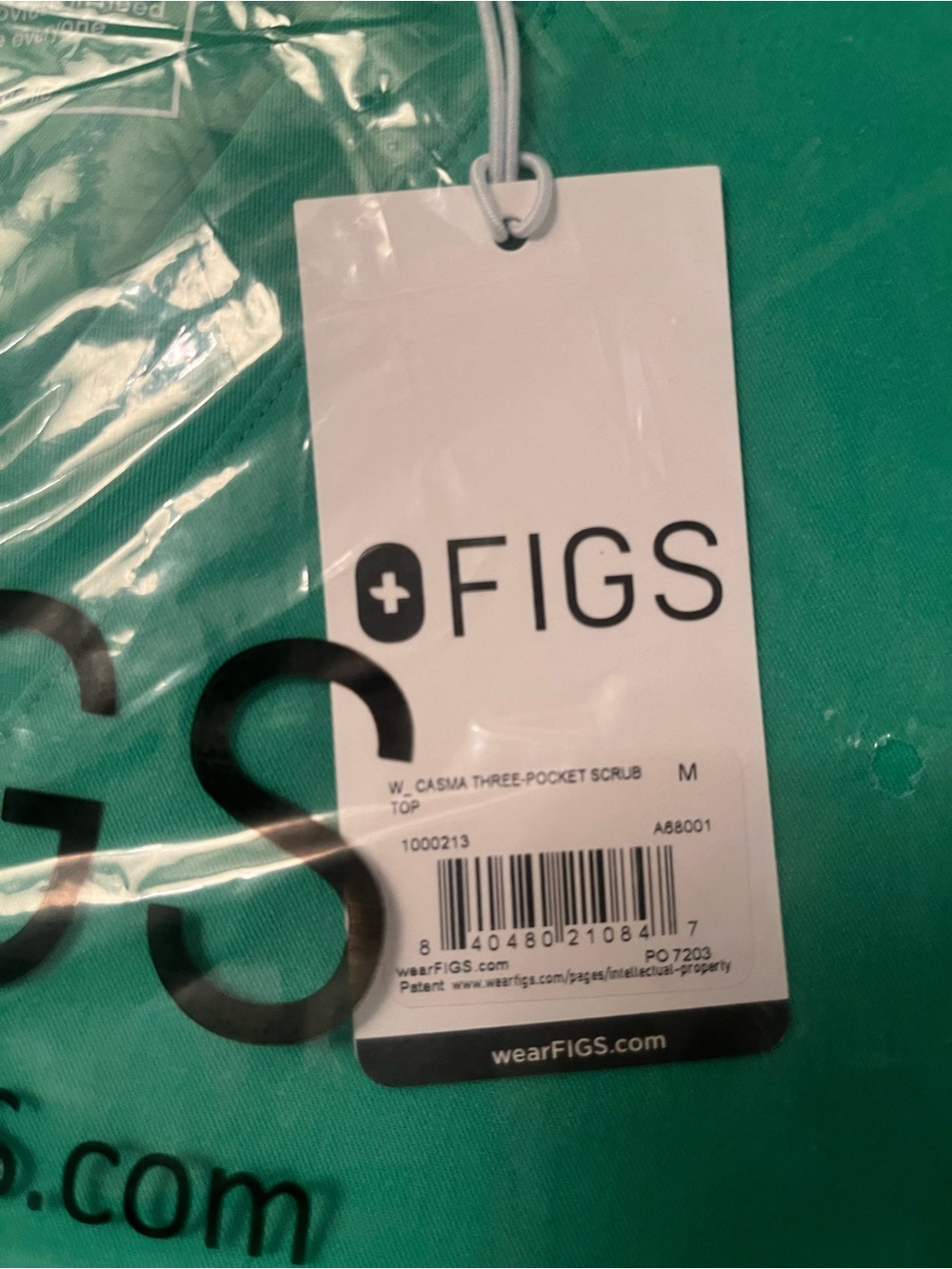 FIGS Casma Three-Pocket
Scrub Top™, M, Emerald Green - Picture 5 of 5